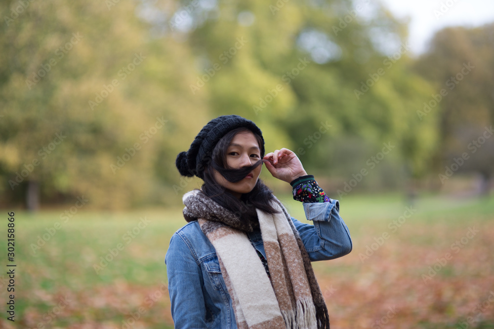 Charming Asian woman portrait in autumn season Charming Asian woman portrait in autumn season
