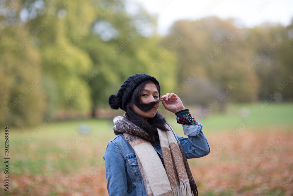 Charming Asian woman portrait in autumn season Charming Asian woman portrait in autumn season