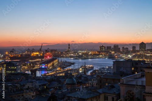 GENOA  ITALY  NOVEMBER  5  2019 - Aerial view of Genoa  Italy at dusk  the harbor with the hiistoric centre  Italy  Europe