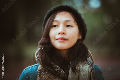 Charming Asian woman portrait in autumn season