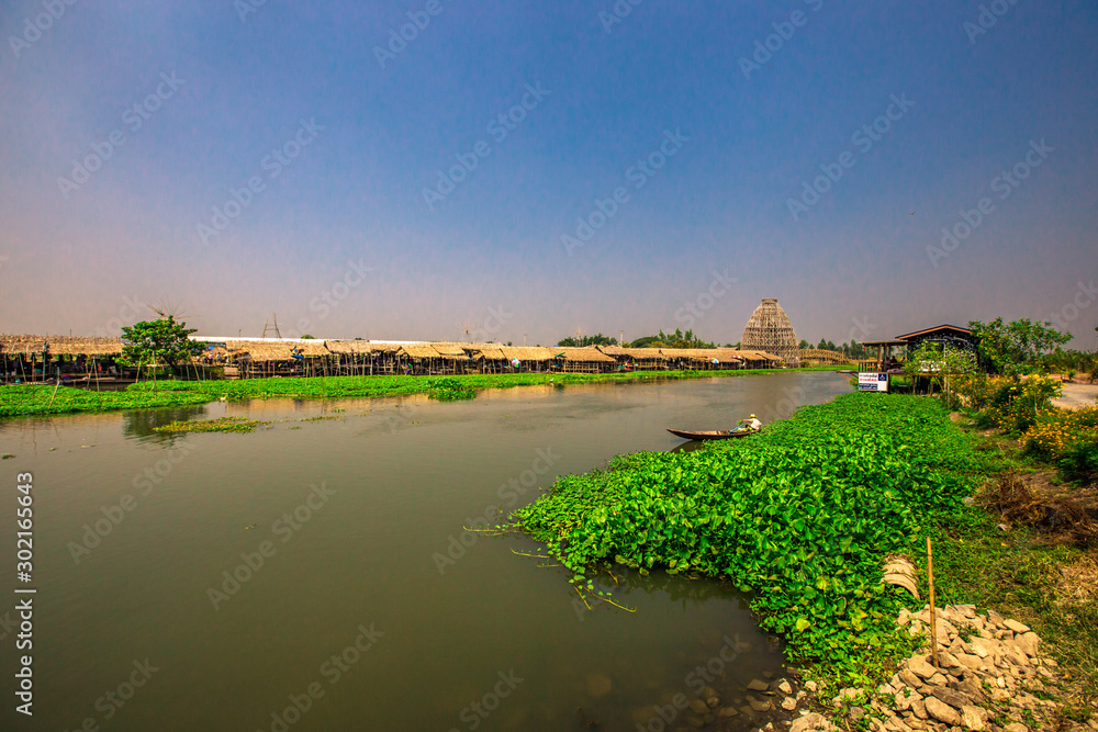 Saphan Khong Floating Market - SuphanBuri:10 November2019,River side attractions(giant fish randomly,bamboo bridge)There are tourists visiting to see the food,eat while onholiday,SongPhiNong,thailand Saphan Khong Floating Market - SuphanBuri:10 November2019,River side attractions(giant fish randomly,bamboo bridge)There are tourists visiting to see the food,eat while onholiday,SongPhiNong,thailand