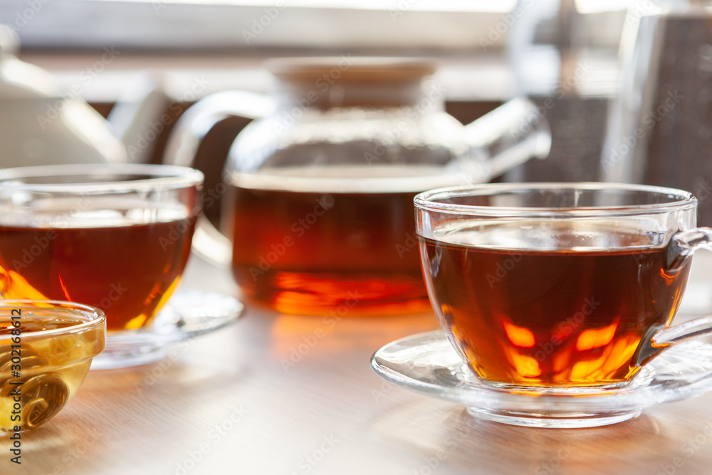 Close up of glass tea cup with honey Close up of glass tea cup with honey