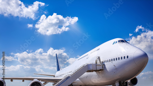 jumbo jet against a blue sky photo