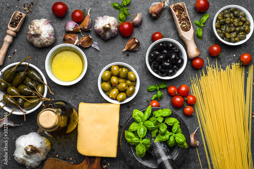 Italian food or mediterranean diet background with ingredients, top view, flat lay