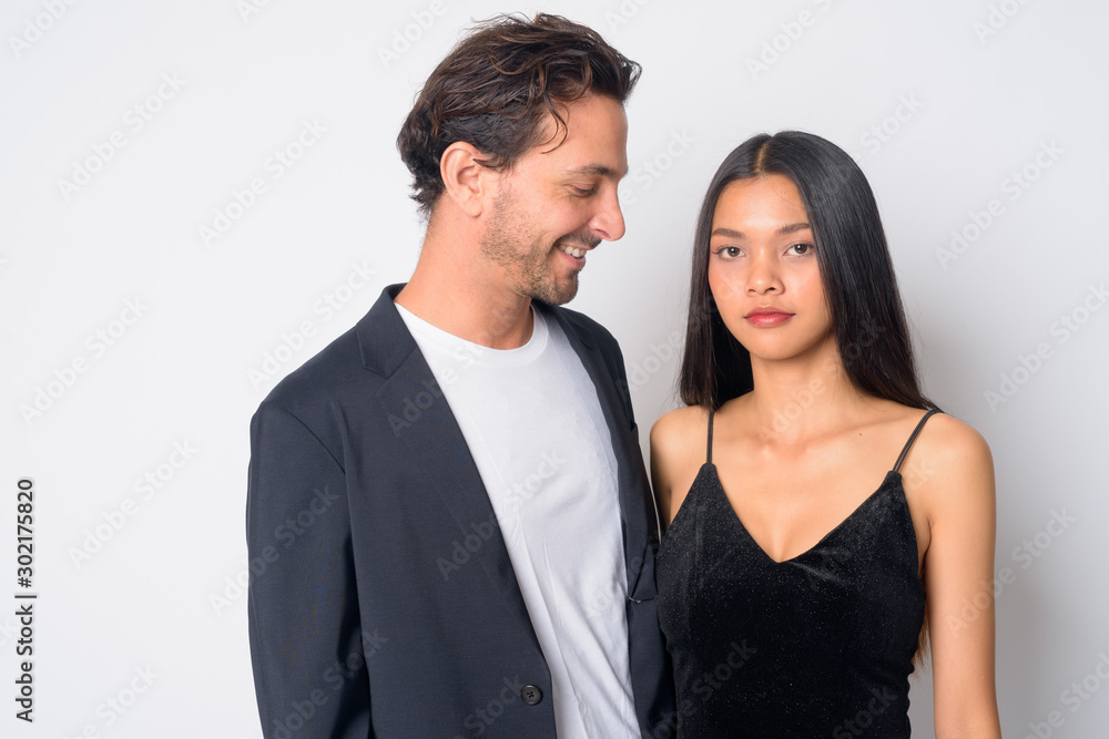Portrait of happy multi ethnic business couple together and in love Portrait of happy multi ethnic business couple together and in love