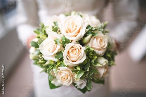 Bridal bouquet of various roses.