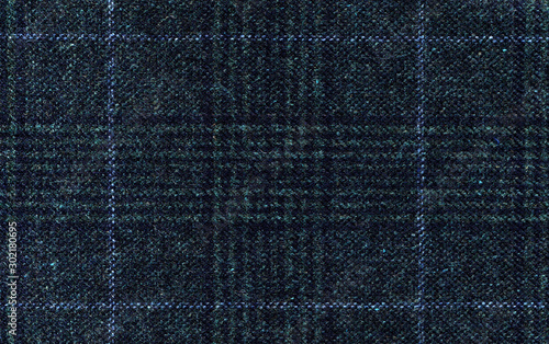 Dark grey woolen fabric. Classic blue check. Geometric patterns in Cashmere. Traditional Scottish Glen plaid. Expensive men's suit fabric. High resolution