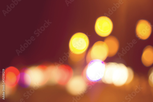 Bokeh with colorful spherical lights alternating with the background image. © prasit
