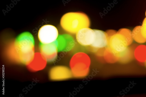 Foto Bokeh with colorful spherical lights alternating with the background image