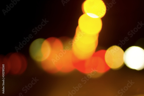Obraz na plátne Bokeh with colorful spherical lights alternating with the background image
