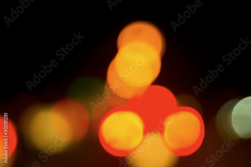 Obraz na plátne Bokeh with colorful spherical lights alternating with the background image