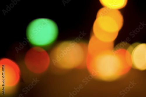 Bokeh with colorful spherical lights alternating with the background image
