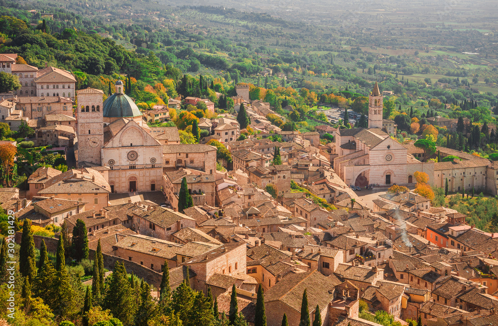 View of Assisi charming historic center and Umbria countryside seen from above with St Rufinus Cathedral and Basilica of St Clare