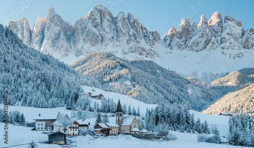 Canvas Print The small village in Dolomites mountains in winter.