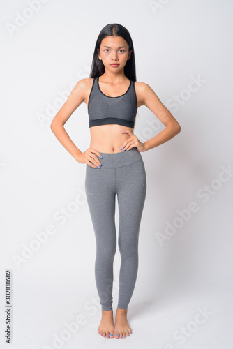 Full body shot of young Asian woman ready for gym © Ranta Images