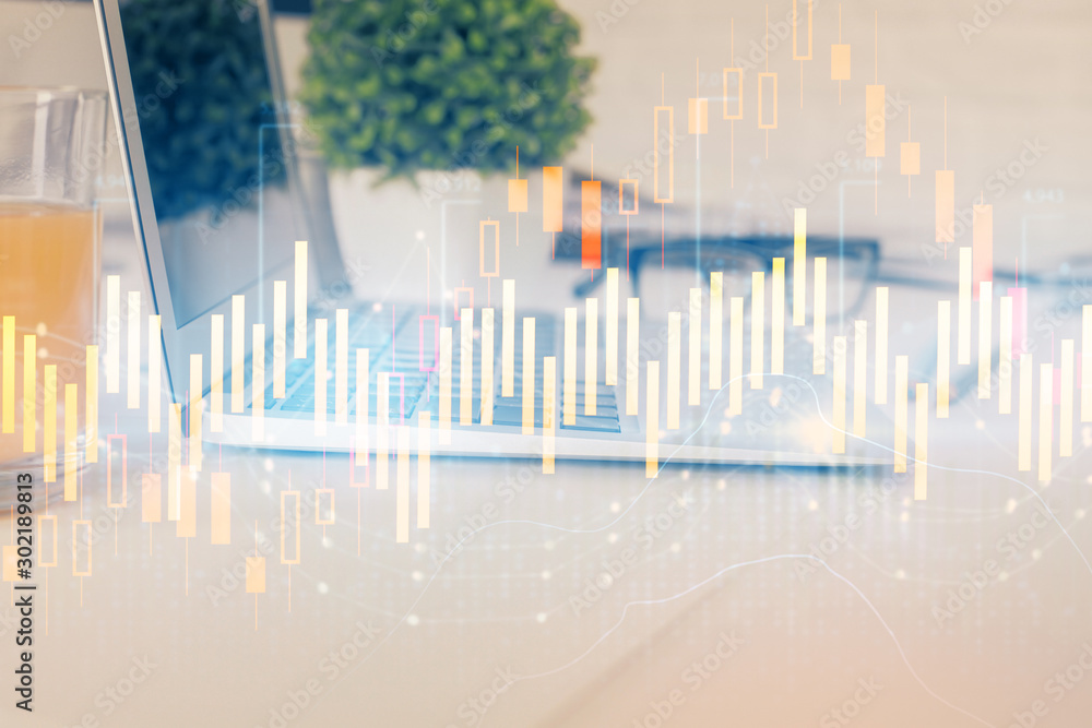 Forex graph hologram on table with computer background. Multi exposure. Concept of financial markets. Forex graph hologram on table with computer background. Multi exposure. Concept of financial markets.