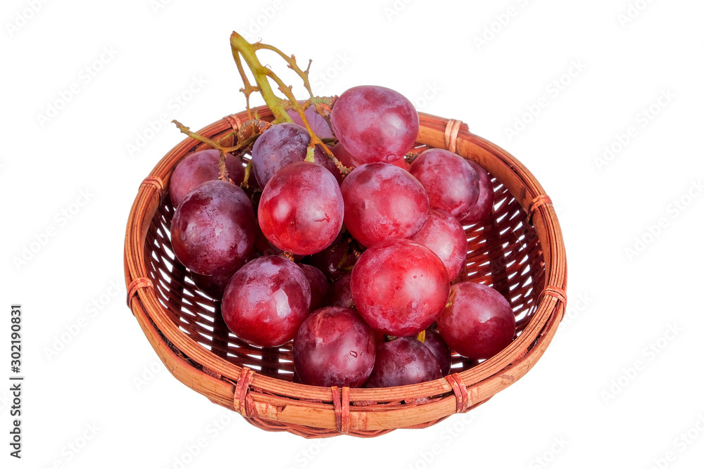 Fresh bunch of grapes on plate isolated on white background Fresh bunch of grapes on plate isolated on white background