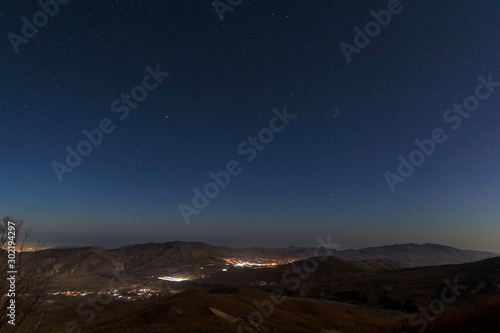 Khizi city panorama under the night sky © alexmu