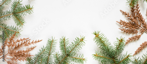 Christmas flat lay top view  gifts in different wrappers boxes on a white background  festive decor copy space.Long banner