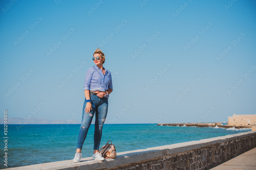 Nice woman on a nature background. Concept of freedom and relax