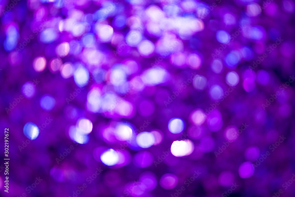 Glitter lights abstract background. Disfocused bokeh