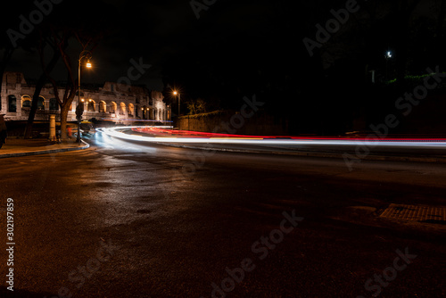 light trails of the cars in the way of the imperial holes, Rome