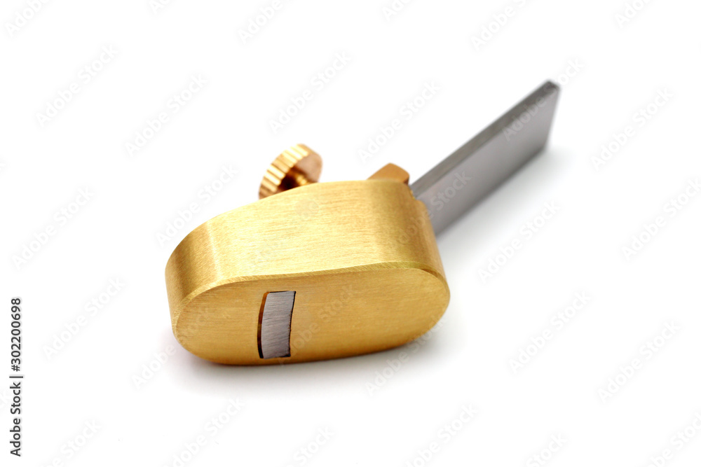 violin craftsman mini wood planer on a white background close-up violin craftsman mini wood planer on a white background close-up