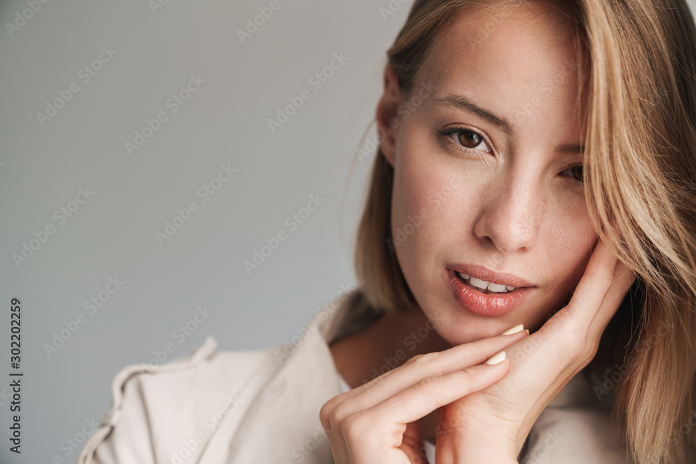 Close up of a lovely young blonde short haired woman Close up of a lovely young blonde short haired woman