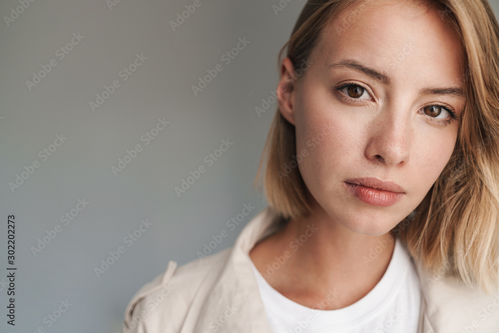 Close up of a lovely young blonde short haired woman