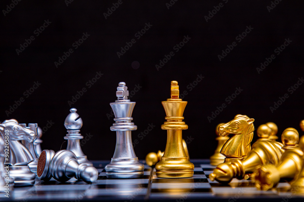 Premium Photo, Golden king chess piece concept for business competition  and strategy.