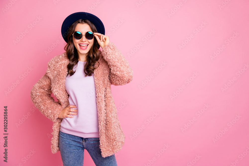 Photo of pretty youngster model lady going street enjoy watching sightseeing abroad wear stylish fluffy jacket jeans sun specs retro blue hat isolated pink background Photo of pretty youngster model lady going street enjoy watching sightseeing abroad wear stylish fluffy jacket jeans sun specs retro blue hat isolated pink background
