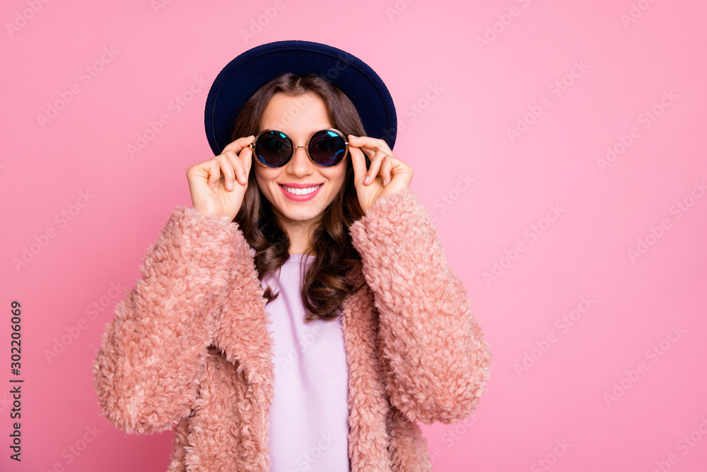 Photo of funny youngster model lady going street enjoy watching sightseeing abroad wear stylish fluffy jacket sun specs retro blue hat isolated pink background Photo of funny youngster model lady going street enjoy watching sightseeing abroad wear stylish fluffy jacket sun specs retro blue hat isolated pink background