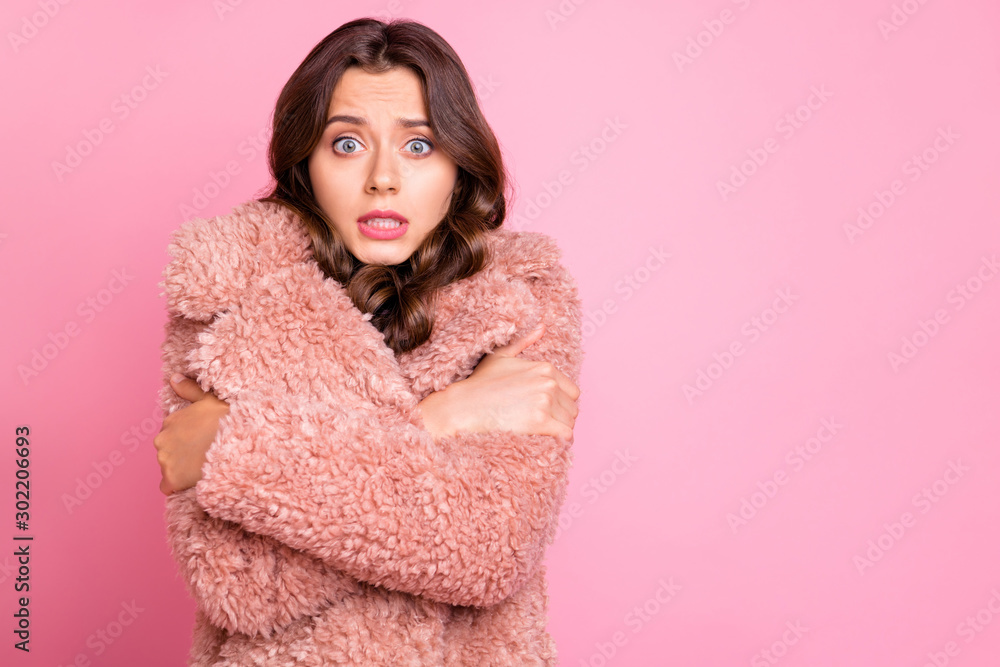Photo of amazing millennial model lady hugging herself unexpected chilly weather wearing stylish youth fluffy autumn jacket isolated pink background Photo of amazing millennial model lady hugging herself unexpected chilly weather wearing stylish youth fluffy autumn jacket isolated pink background