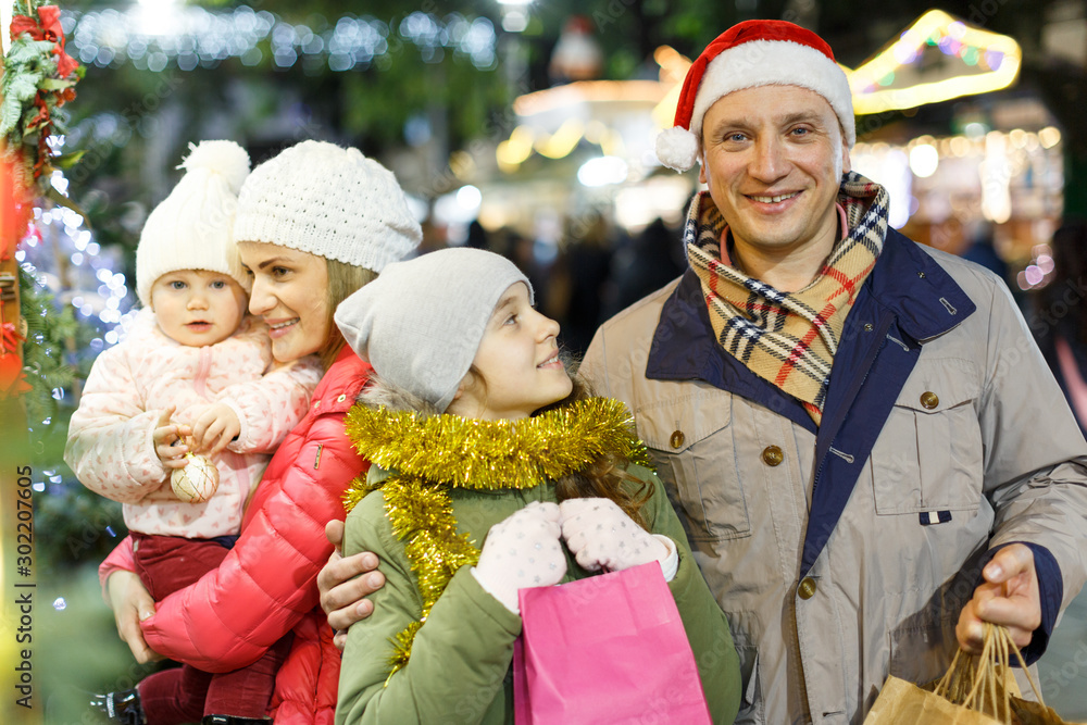 Man and daughter at Christmas market