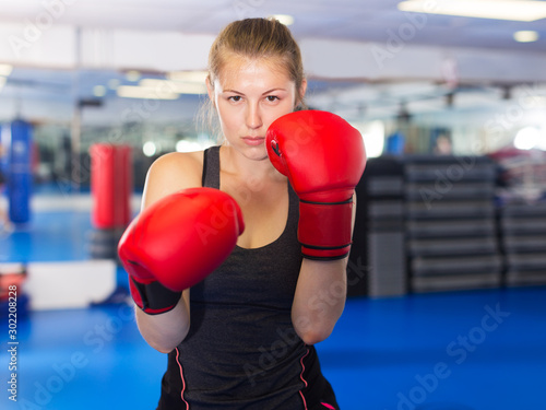 Woman boxing in gym