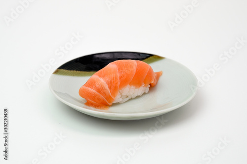 Salmon sushi nigiri japanese cuisine on plate