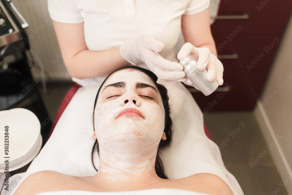 Procedure for applying a moisturizing nourishing mask to the face in a beauty salon Procedure for applying a moisturizing nourishing mask to the face in a beauty salon