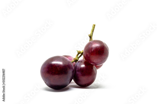 Ripe purple grape group Sweet fruit. isolated on white.