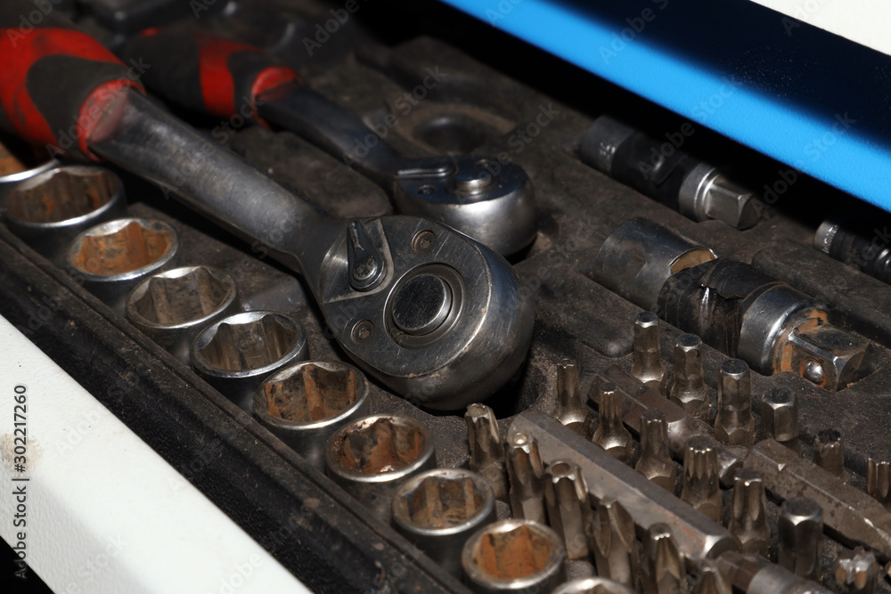 a set of old working tools in a workshop, the work of a mechanic a set of old working tools in a workshop, the work of a mechanic