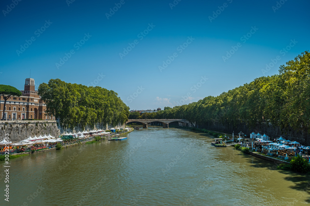 Beautiful view of the river Tiber with the Umberto I bridge in the background in Rome, Italy