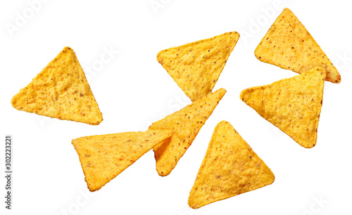 Obraz na plátně Flying delicious mexican nachos chips, isolated on white background