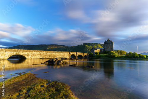 Eilean Donan Castle is one of the most visited and important attractions in the Scottish highlands in sunset with reflection, Scotland