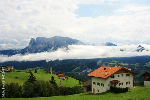 Houses on the slopes of the Dolomites