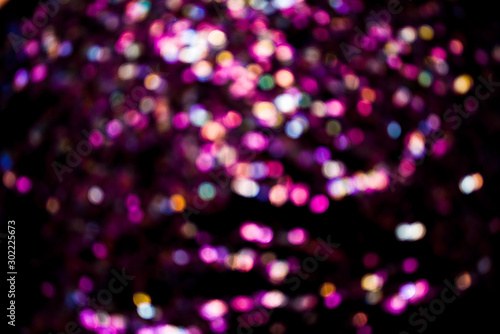 Glitter lights abstract background. Disfocused bokeh