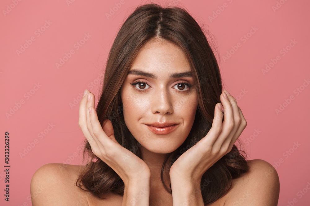 Portrait closeup of happy young shirtless woman smiling at camera Portrait closeup of happy young shirtless woman smiling at camera