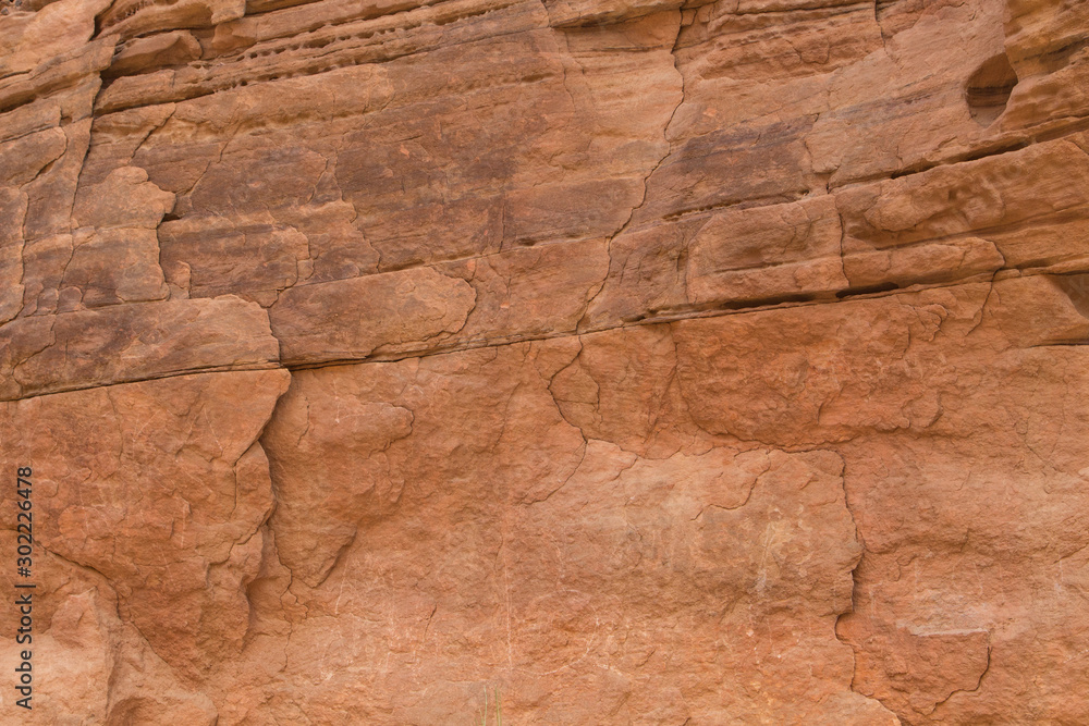 Naklejka premium Natural texture of red rocks. Colored canyon, Egypt, the Sinai Peninsula.
