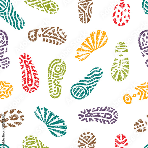 Grunge Colorful footprints Seamless pattern. Hand drawn doodles shoe tracks - Vector illustration