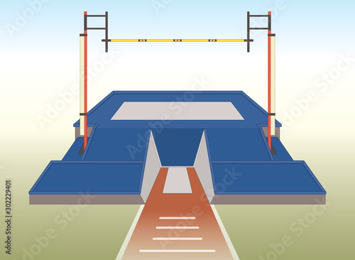 pole vaulting landing pad and pit with sky and grass background