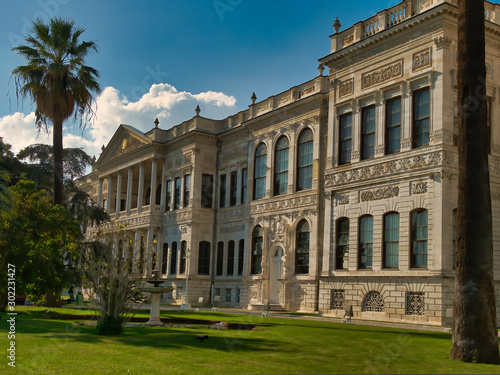 The beautiful and famous Dolmabahce Palace with a garden in front of the palace.