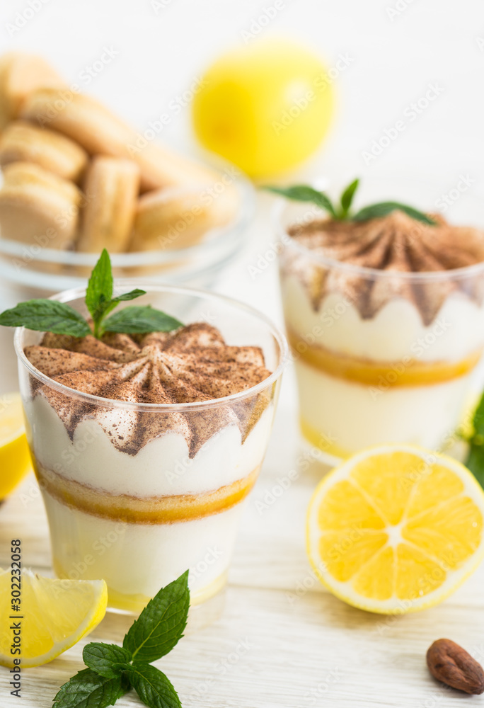 Lemon tiramisu dessert with cocoa and mint Lemon tiramisu dessert with cocoa and mint
